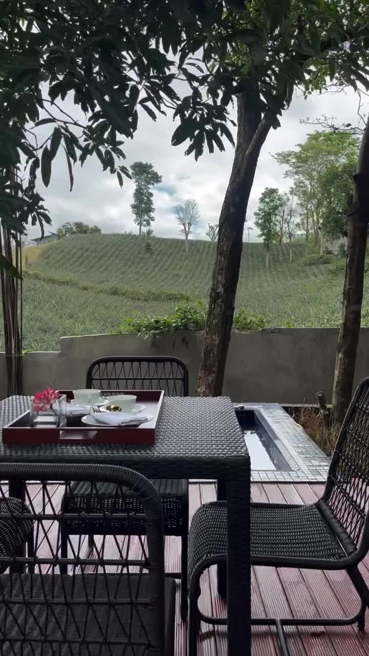 Outdoor dining at Ezra Viniti with scenic Tagaytay hills view